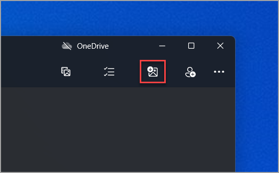 Where to find the Import icon in the Photos app.